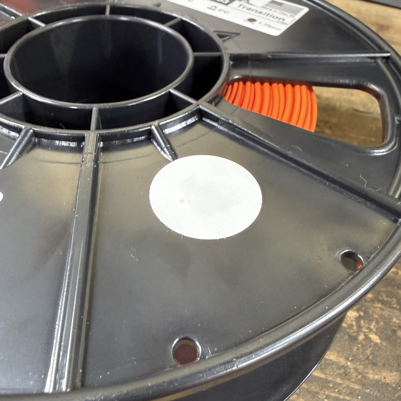 Polar Filament spool with a round NFC tag attached